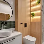 Doki Living By Blue Mandarin Parking & Foodhall Апартаменты